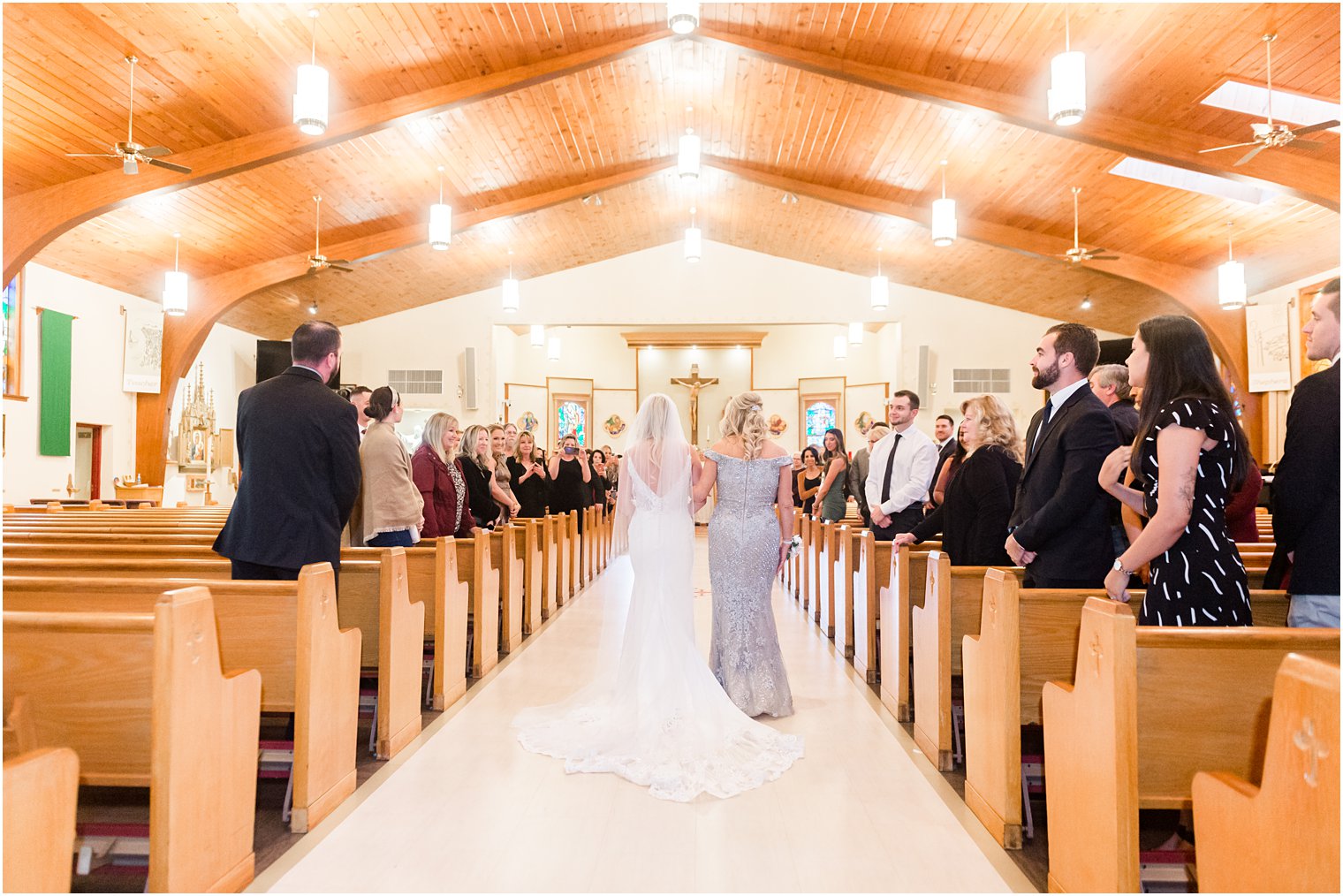 mother walks bride down aisle before church wedding ceremony in Red Bank NJ
