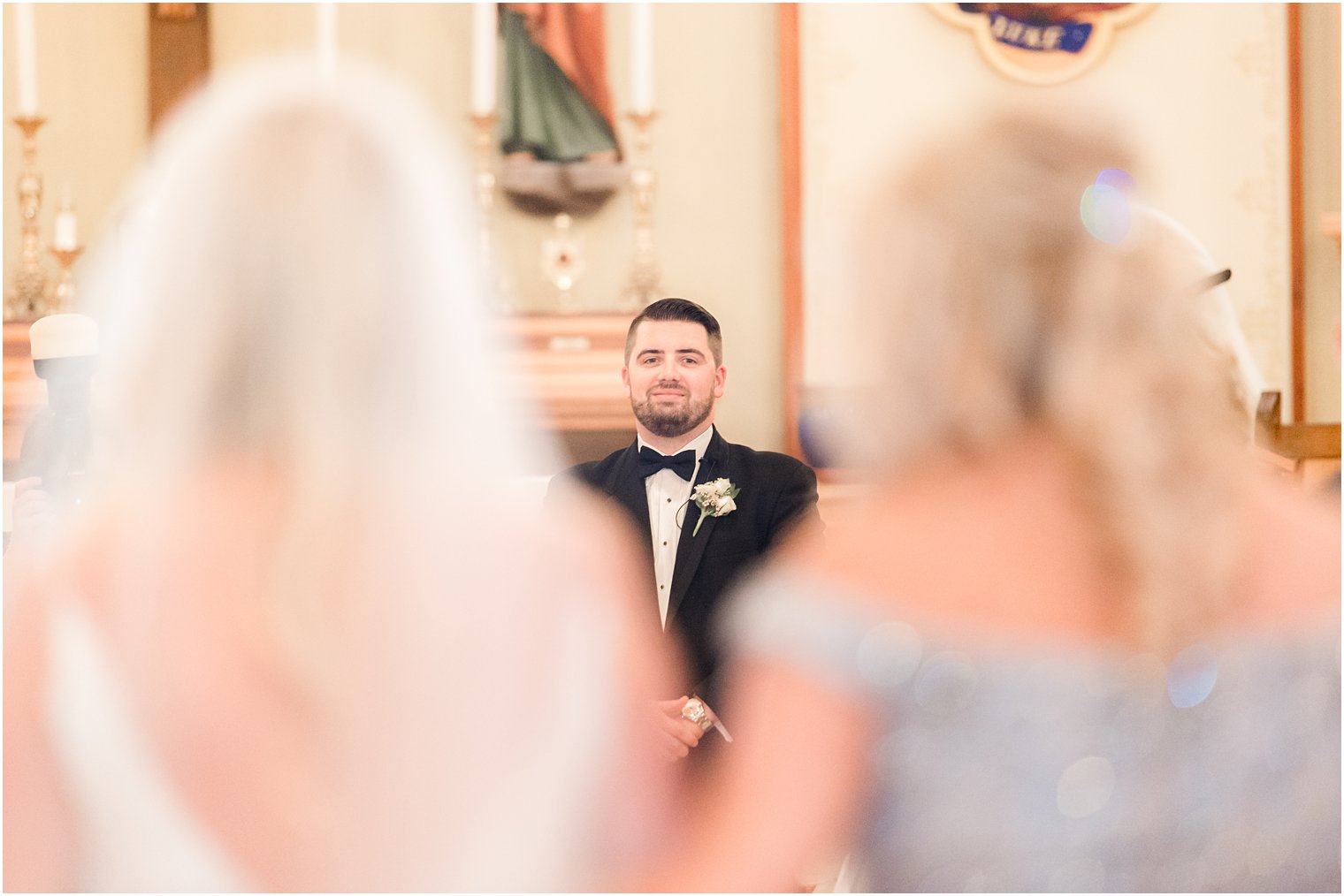 groom tears up watching bride walk down aisle for wedding ceremony 