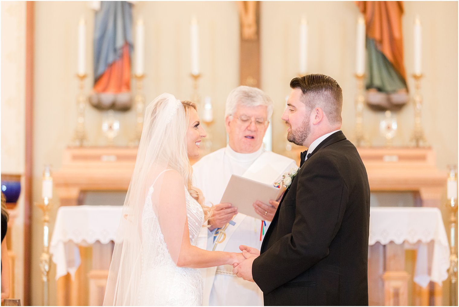 newlywed exchange vows during church wedding ceremony in Red Bank NJ