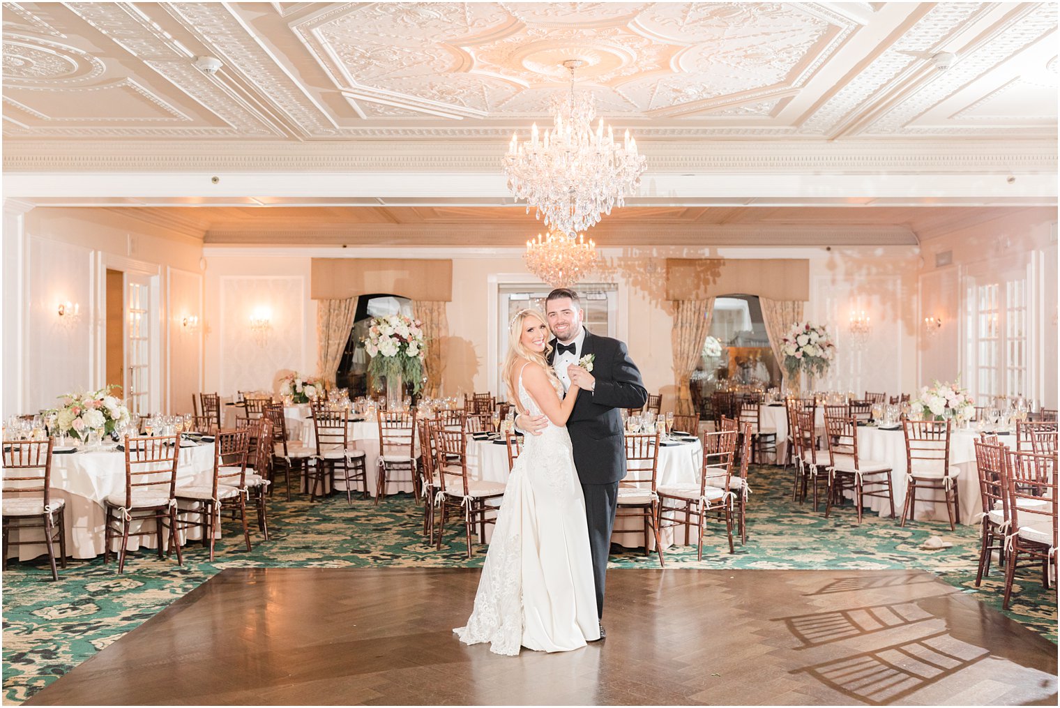 bride and groom dance in reception ballroom at Molly Pitcher Inn