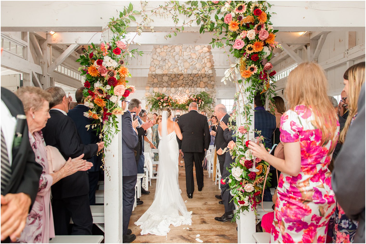 bride and dad walk down aisle for wedding ceremony in Manahawkin NJ