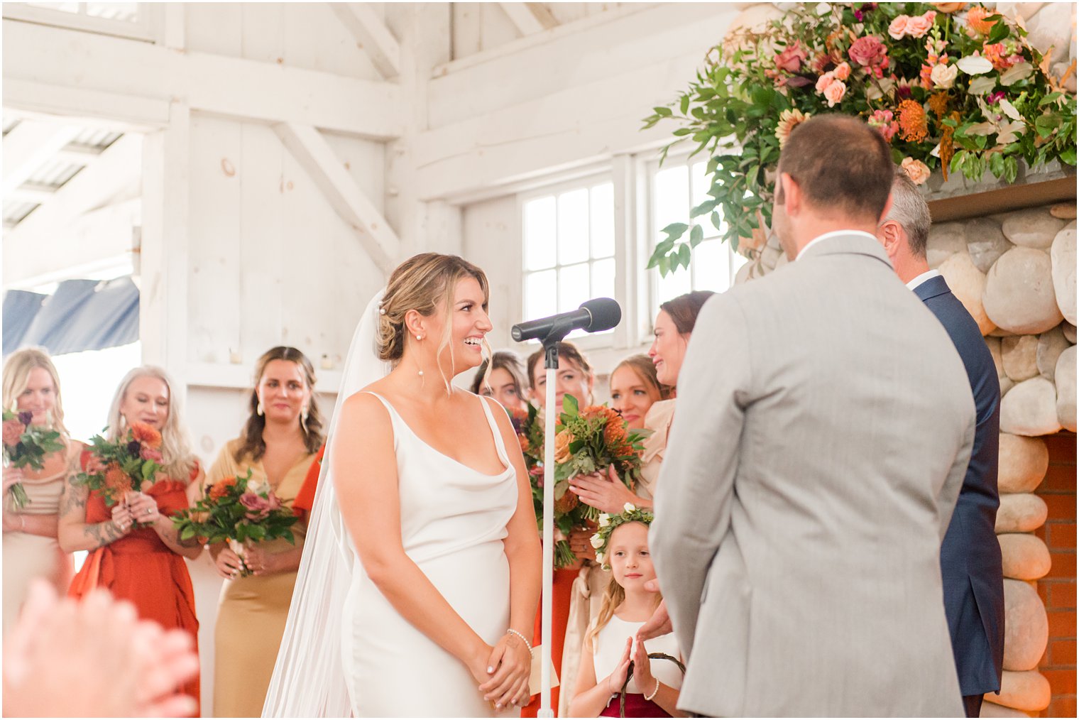 bride laughs during wedding ceremony in Manahawkin NJ