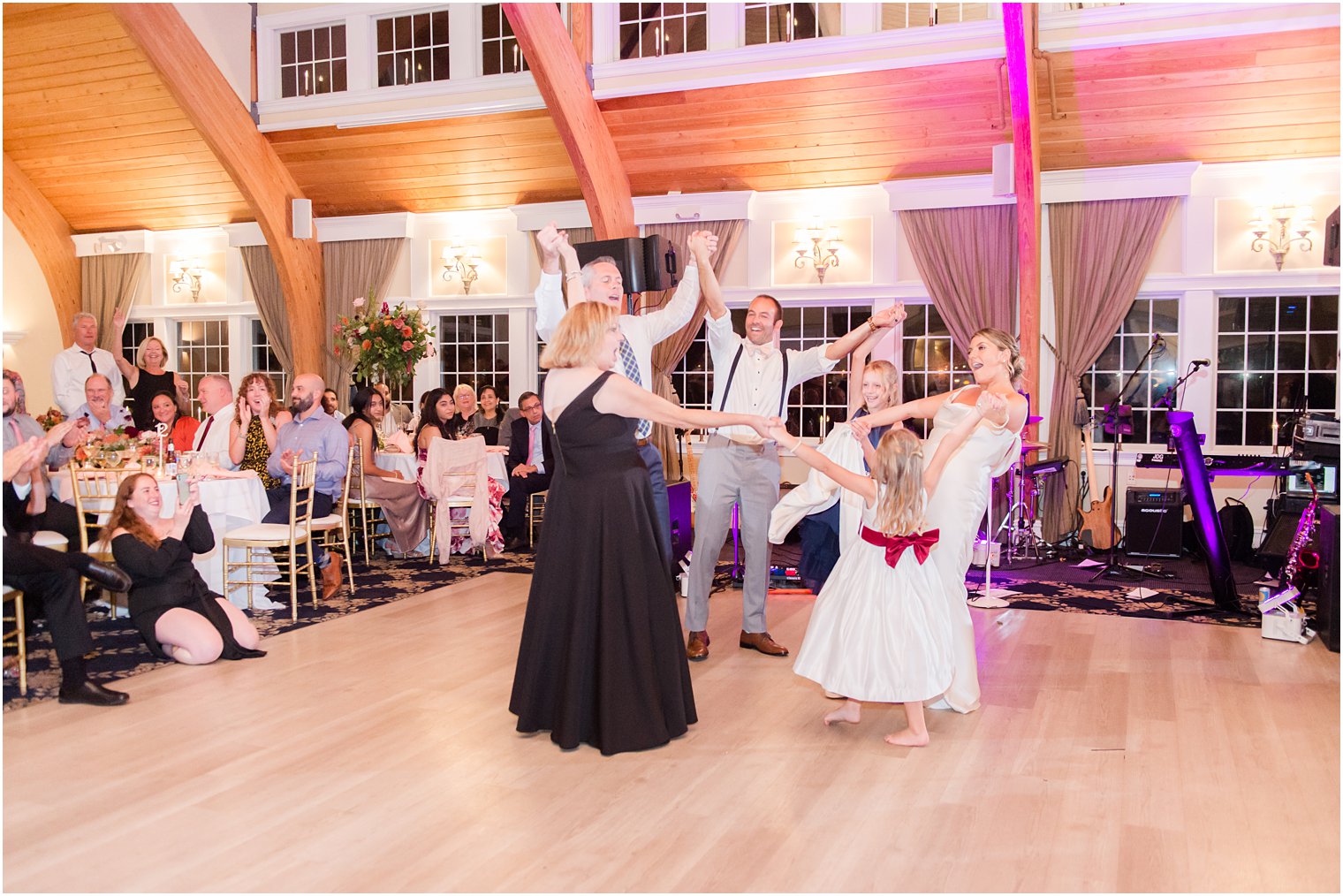 family dances together during New Jersey wedding reception