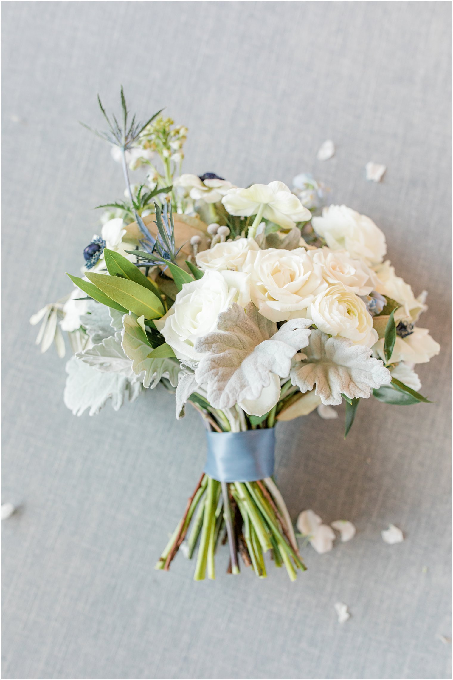 bride's white floral bouquet for fall wedding day