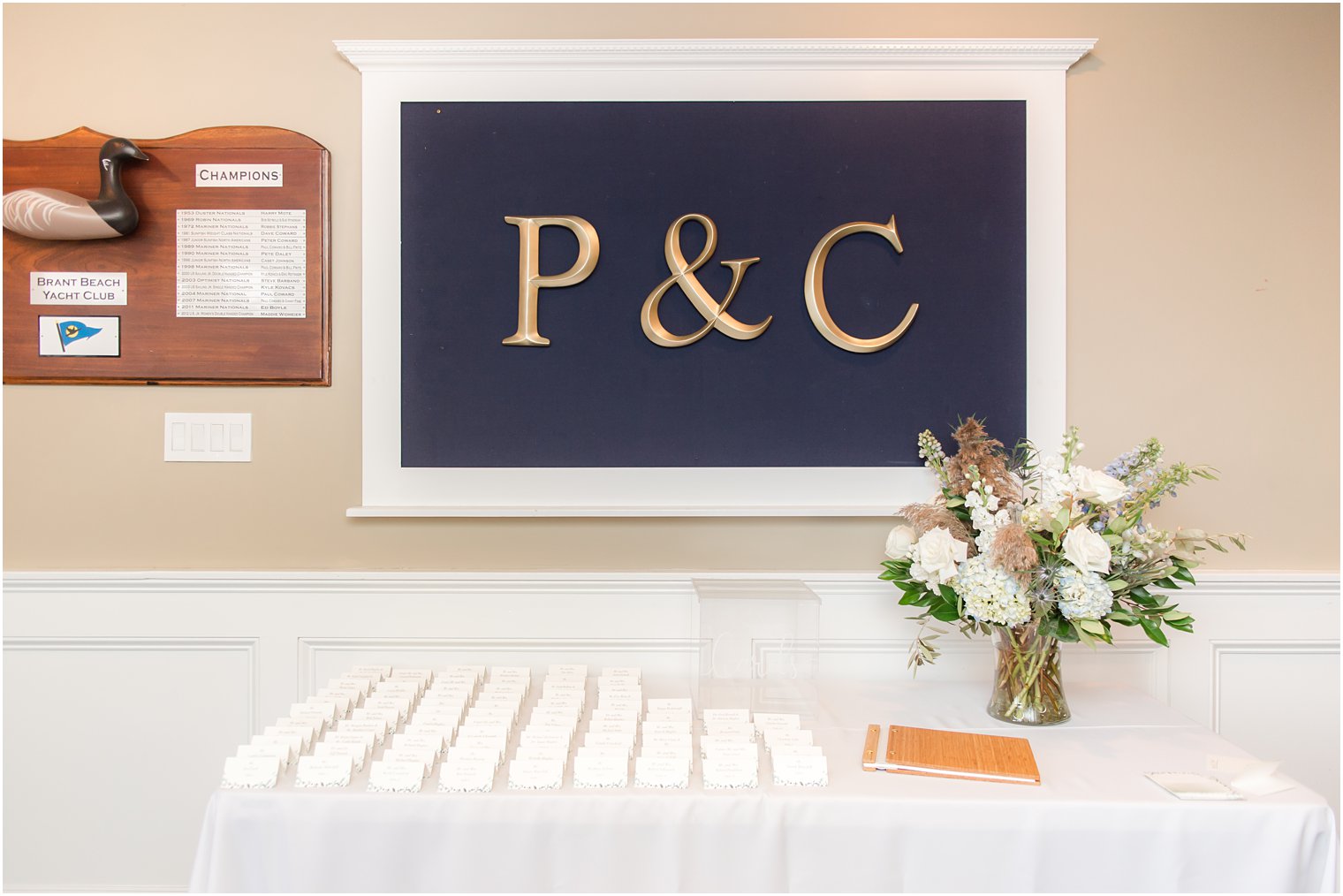 seating card display for beach wedding reception at Brant Beach Yacht Club