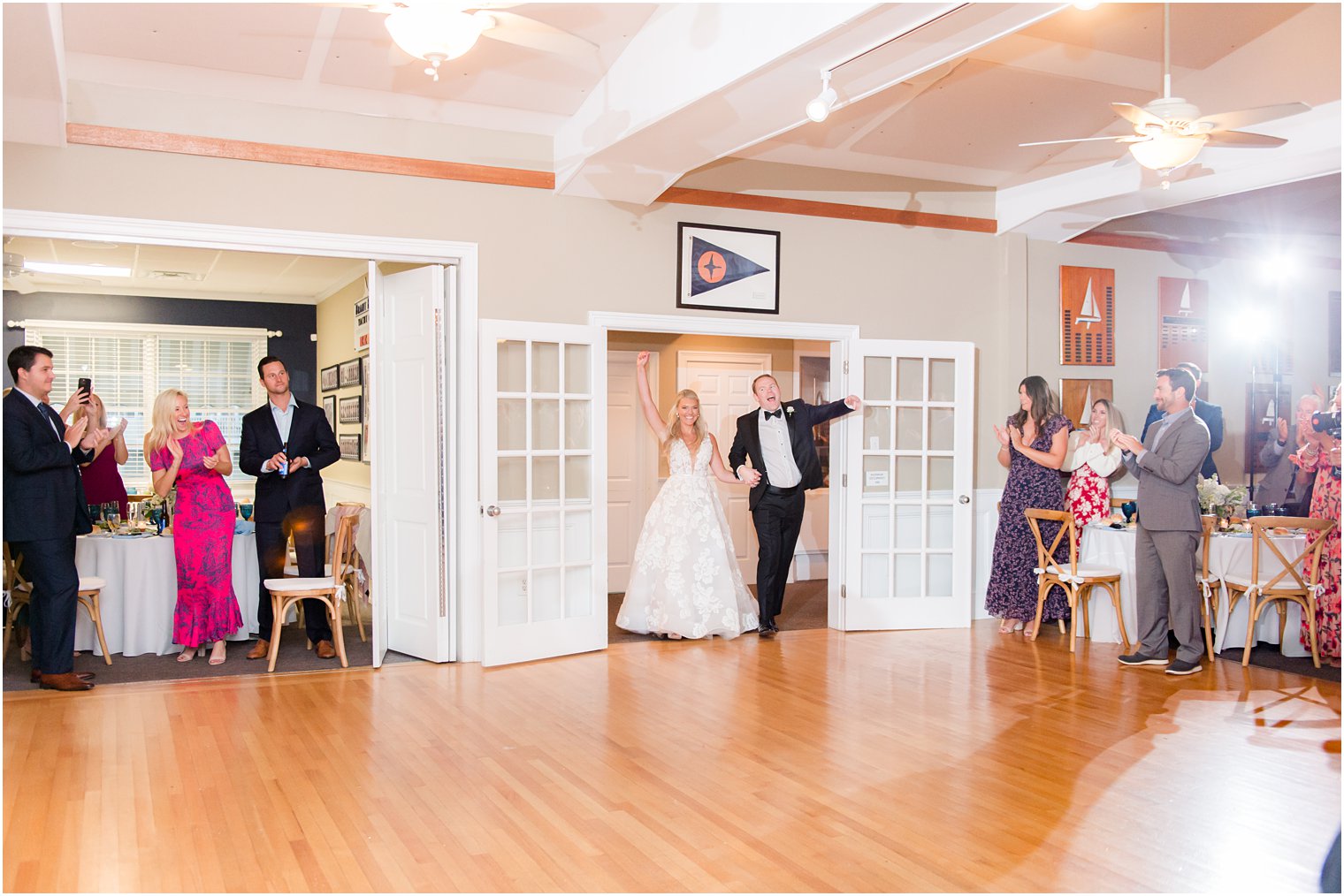 bride and groom dance into wedding reception at Brant Beach Yacht Club