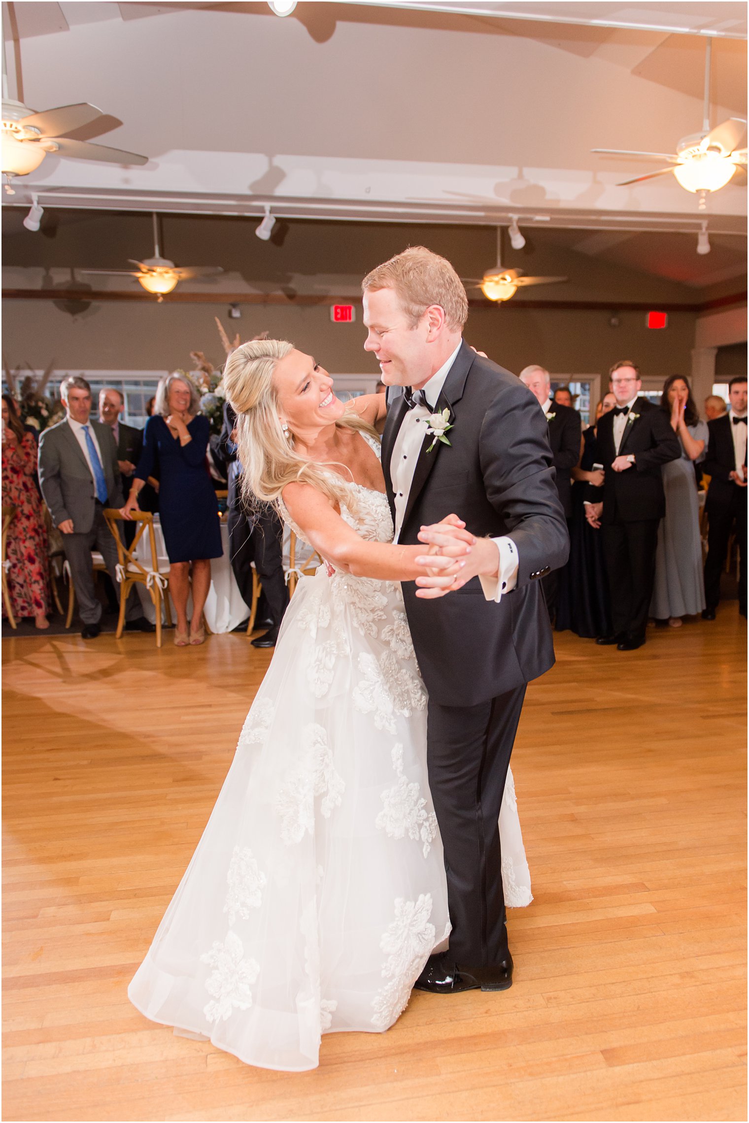 newlyweds dance during wedding reception at Brant Beach Yacht Club