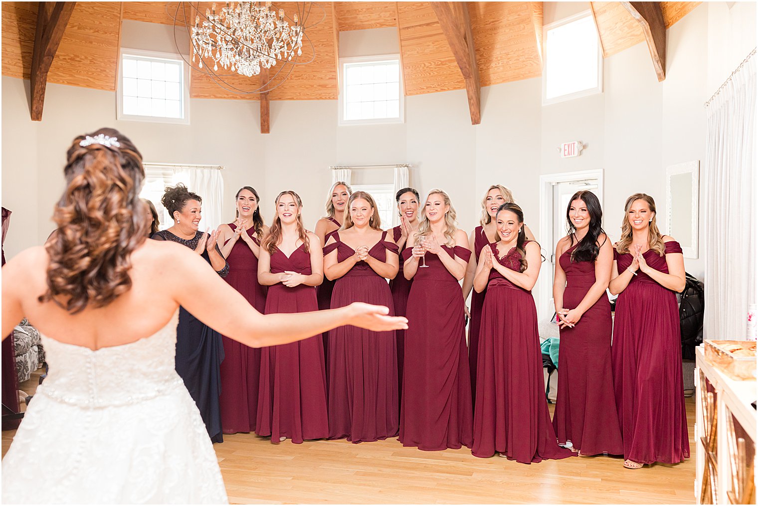 bride and bridesmaids have first look at Bear Brook Valley