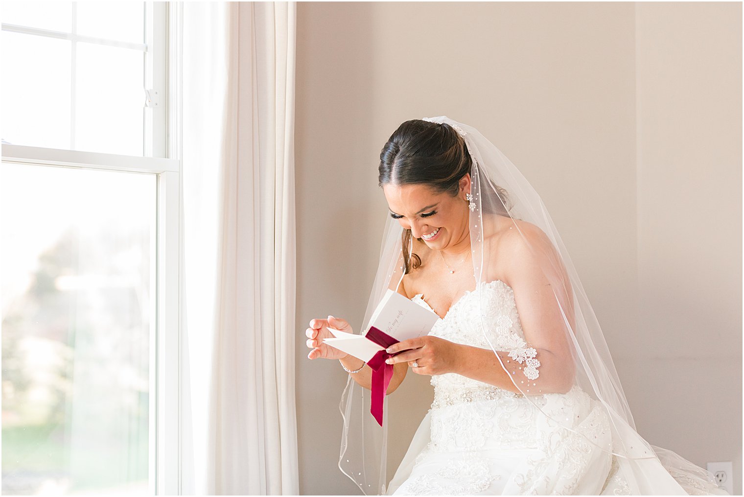 bride reads letter from groom on wedding day