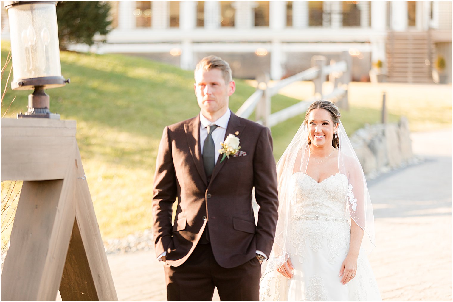 bride approaches groom for first look at 