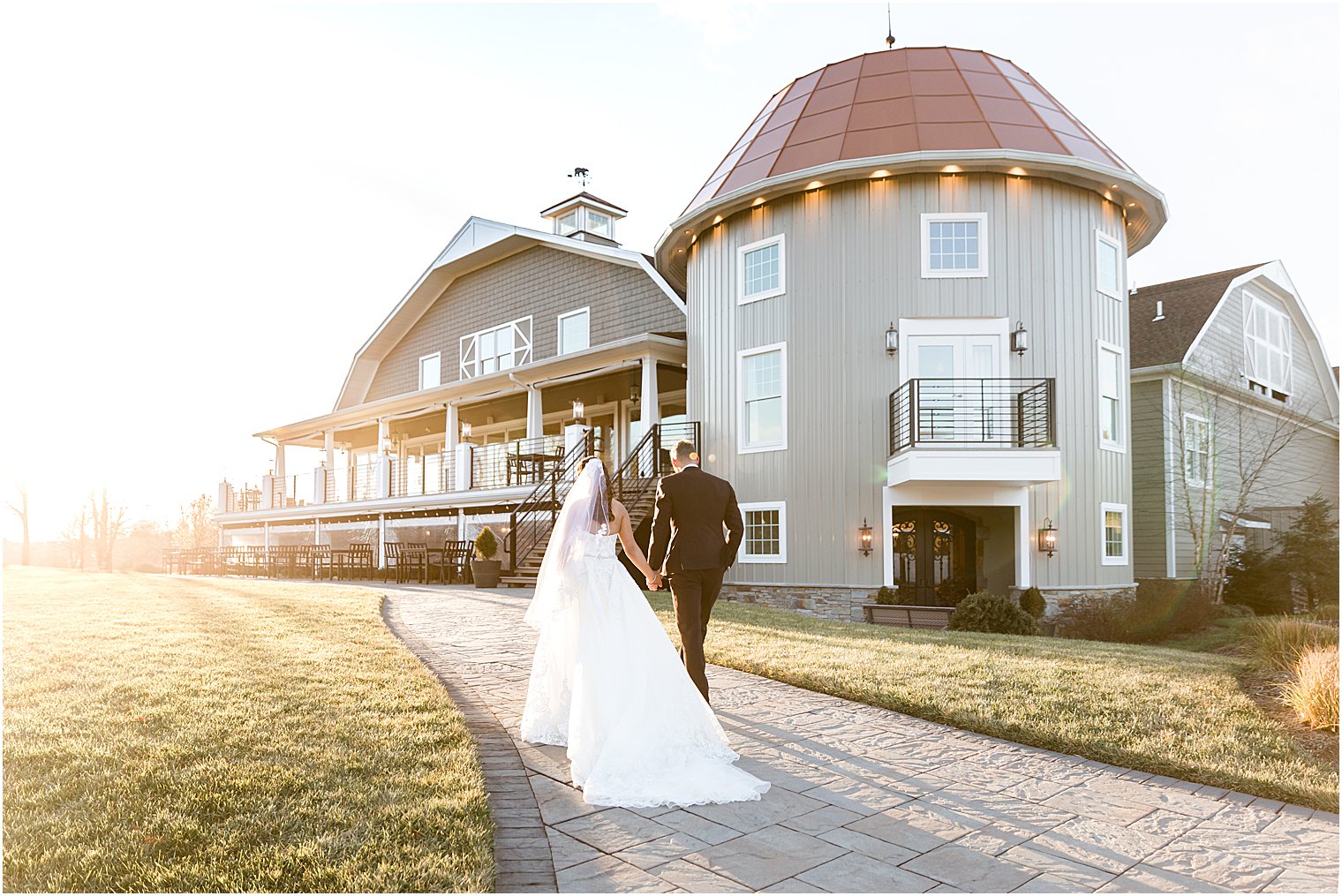 married couple walks up pathway towards Bear Brook Valley