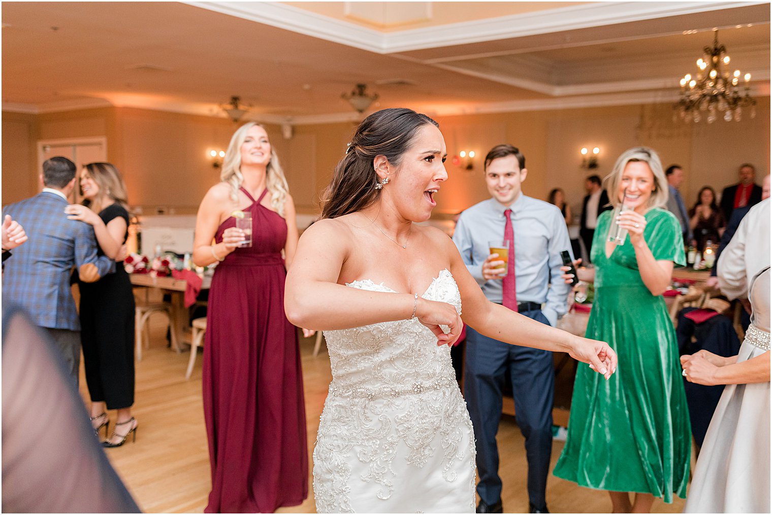 bride dances with friends at NJ wedding reception