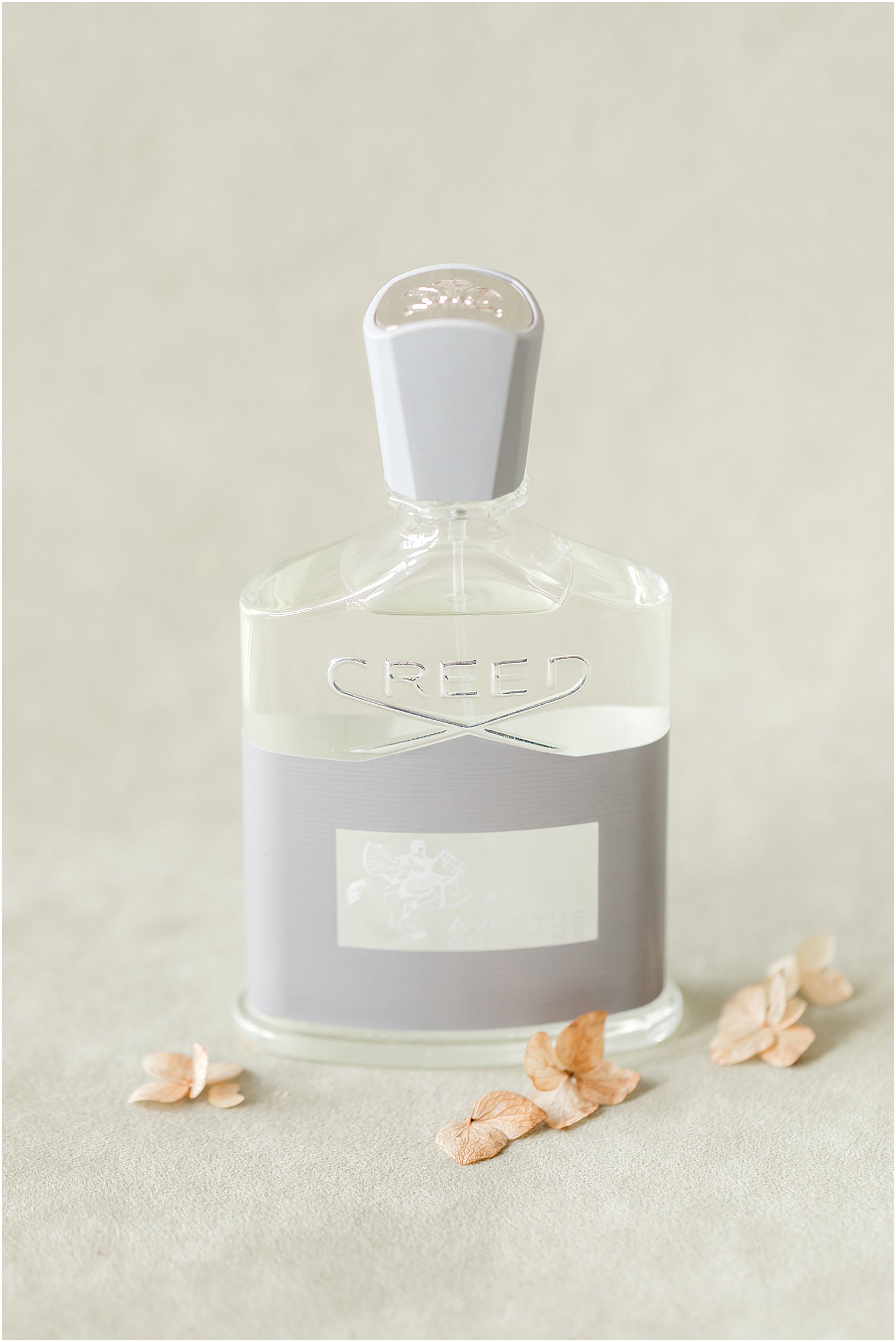groom's Creed cologne for winter wedding in New Jersey 