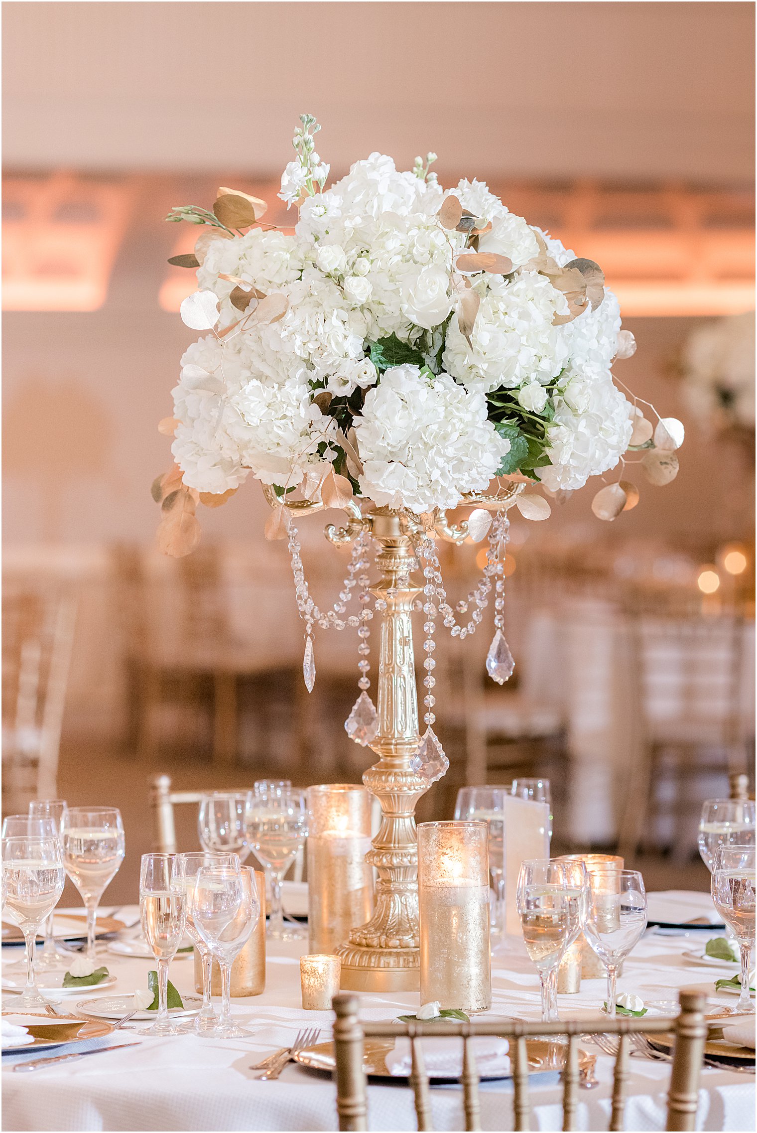 tall centerpieces with white flowers and dripping diamonds at Park Chateau Estate