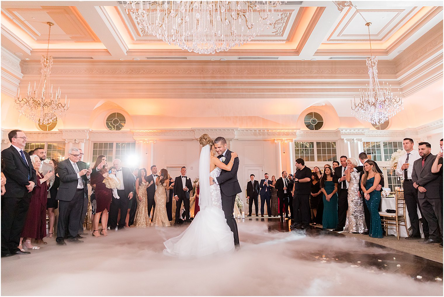 bride and groom dance together during East Brunswick NJ wedding reception