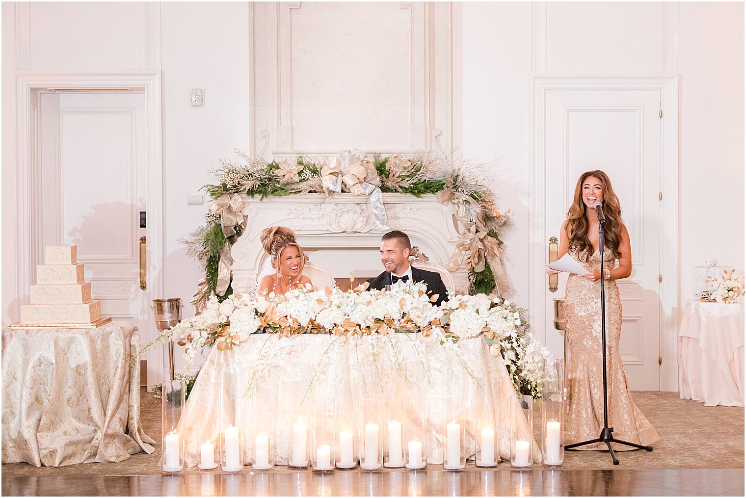 newlyweds laugh during maid of honor's speech at East Brunswick NJ wedding reception