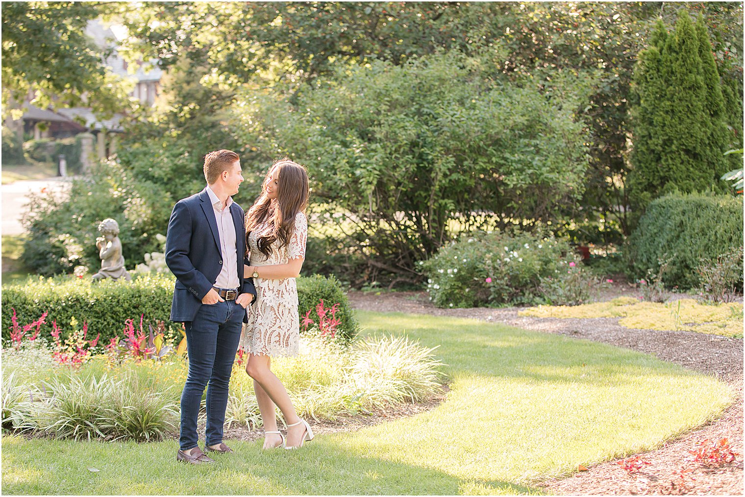 bride and groom pose in gardens at Skylands Manor