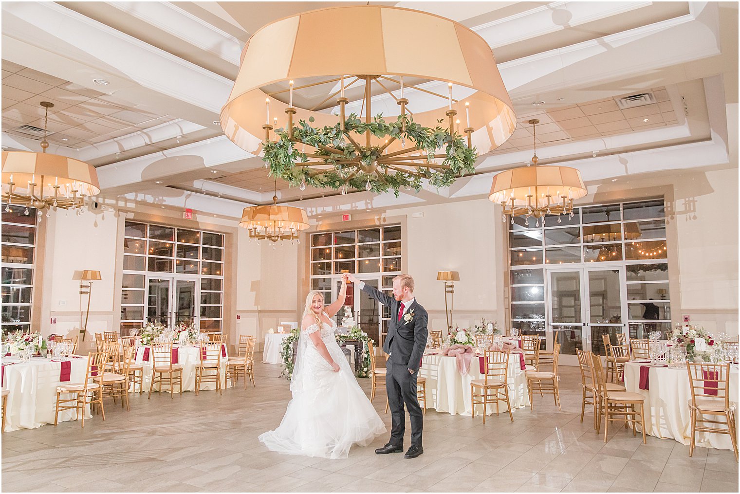 bride and groom dancing in empty ballroom at Stone House at Stirling Ridge