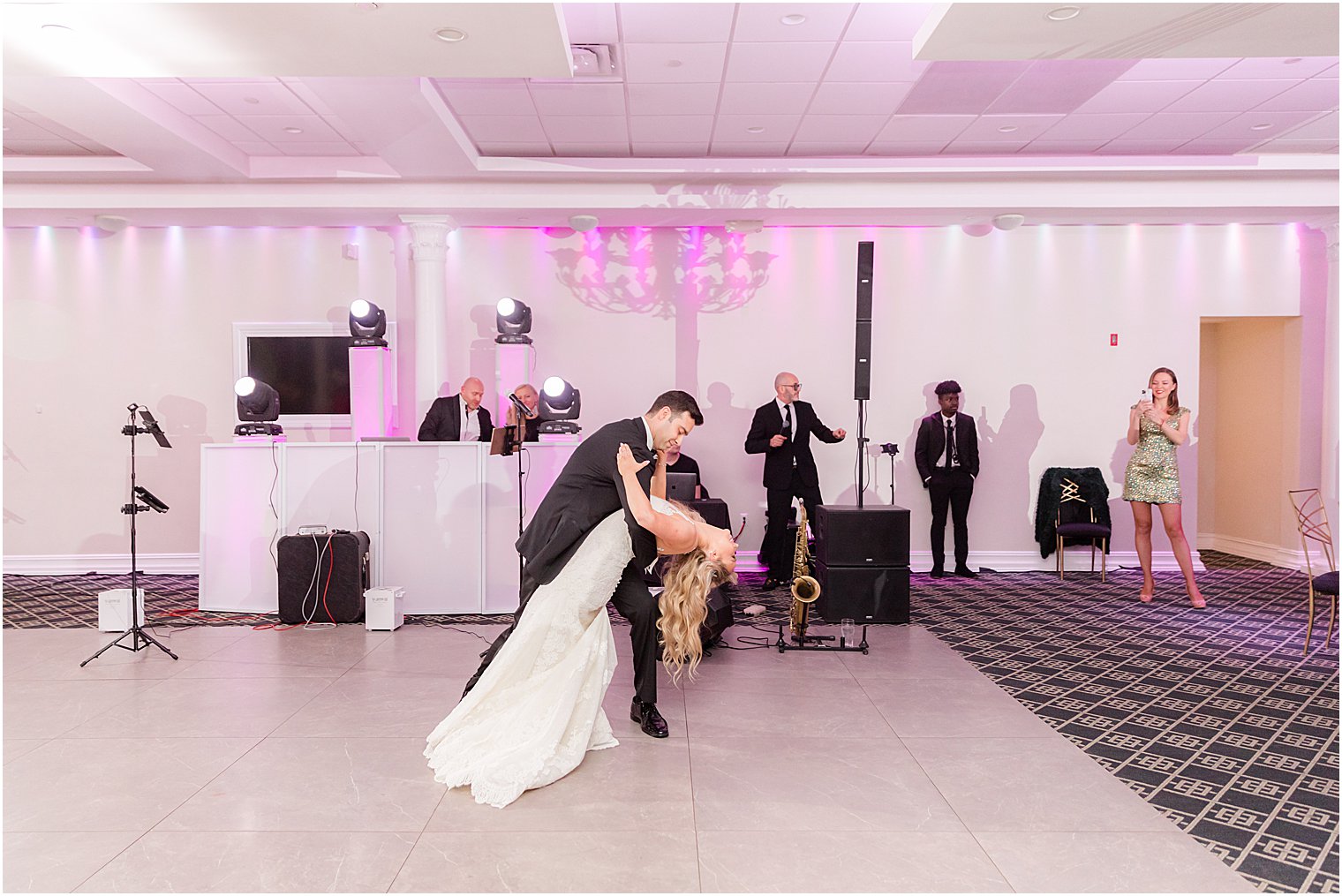 groom dips bride during wedding reception in New Jersey 