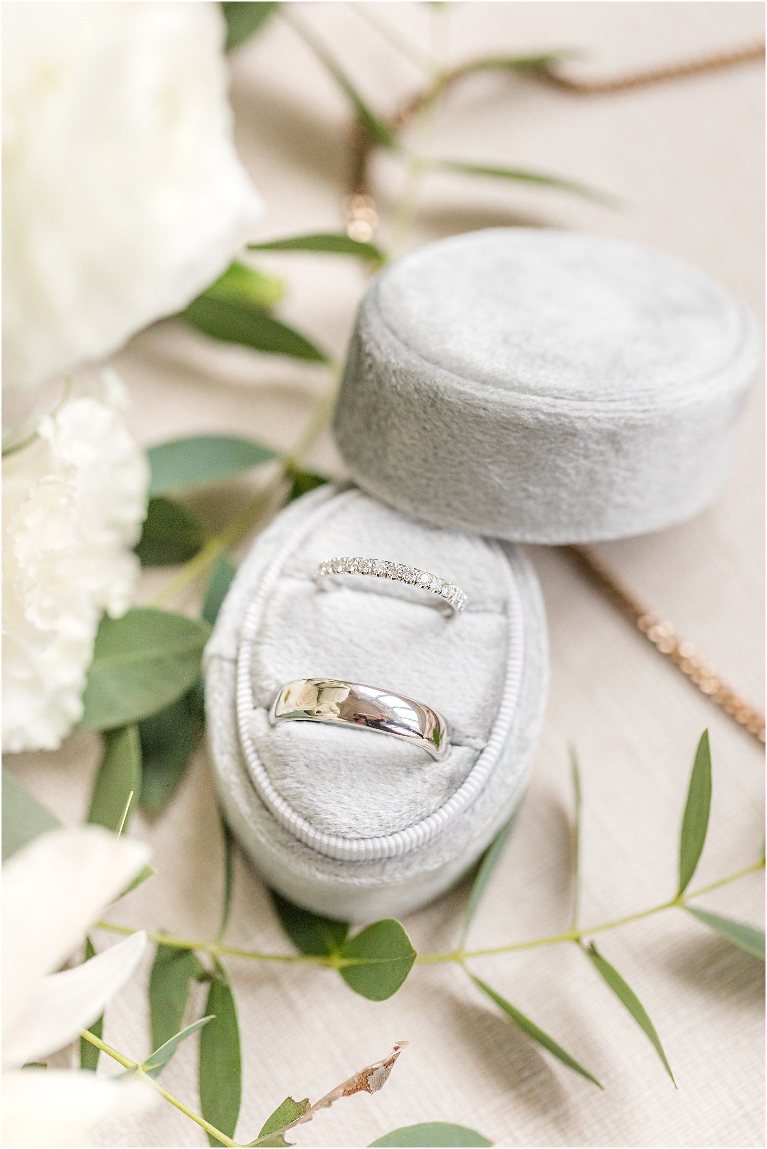 wedding rings in pale grey box