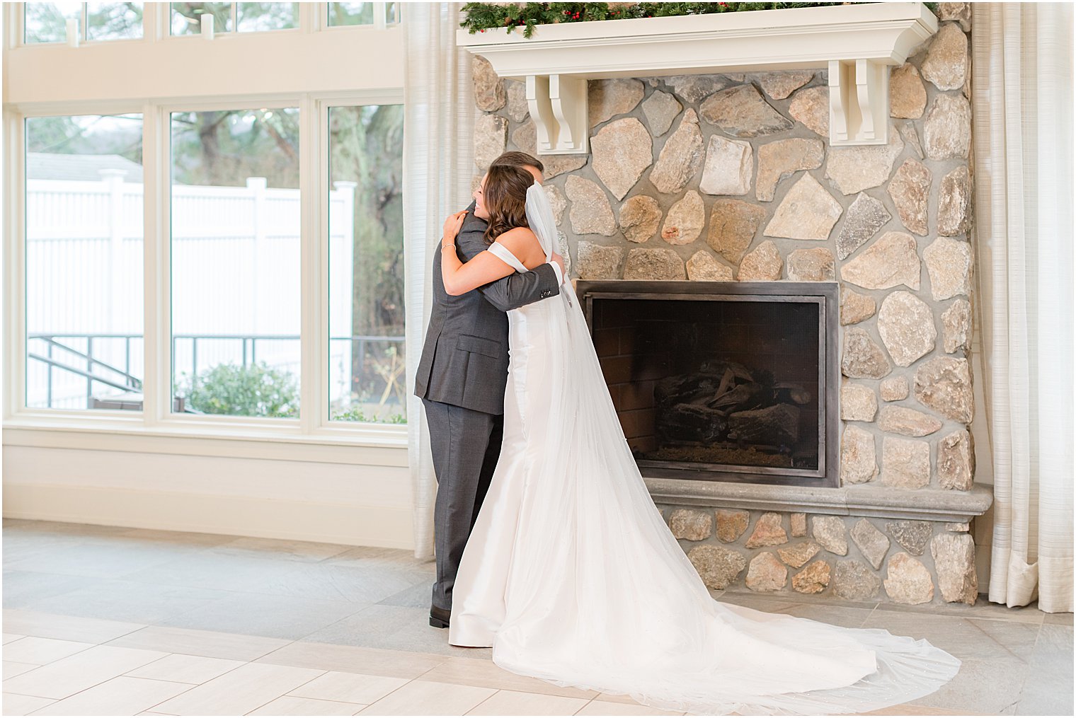 bride hugs father during first look in New Jersey