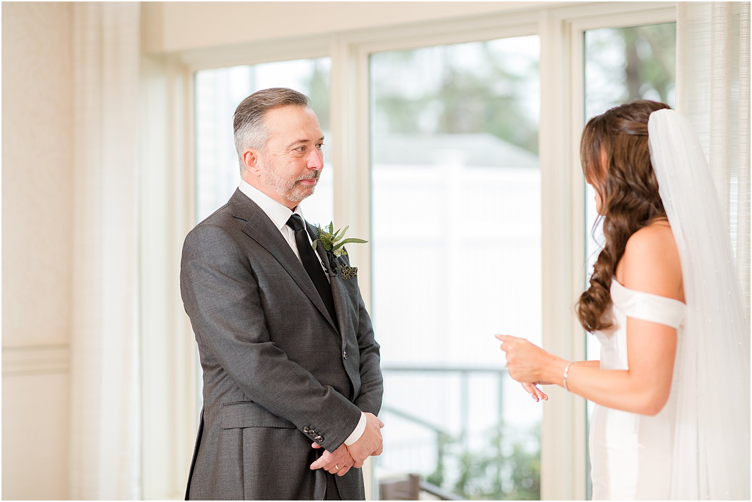 bride and dad talk during first look at Indian Trail Club