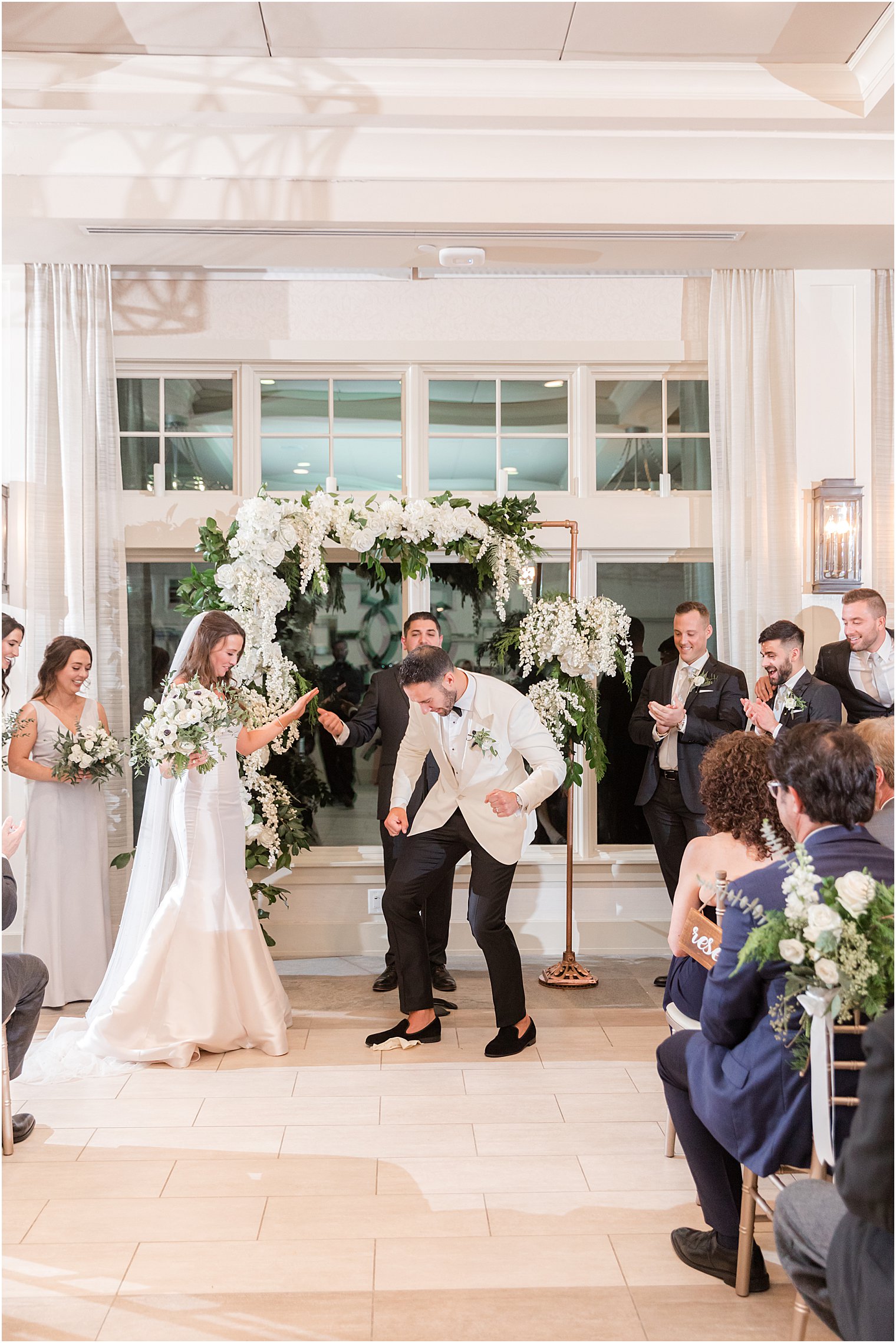 groom breaks glass after Jewish wedding ceremony in Franklin Lakes NJ