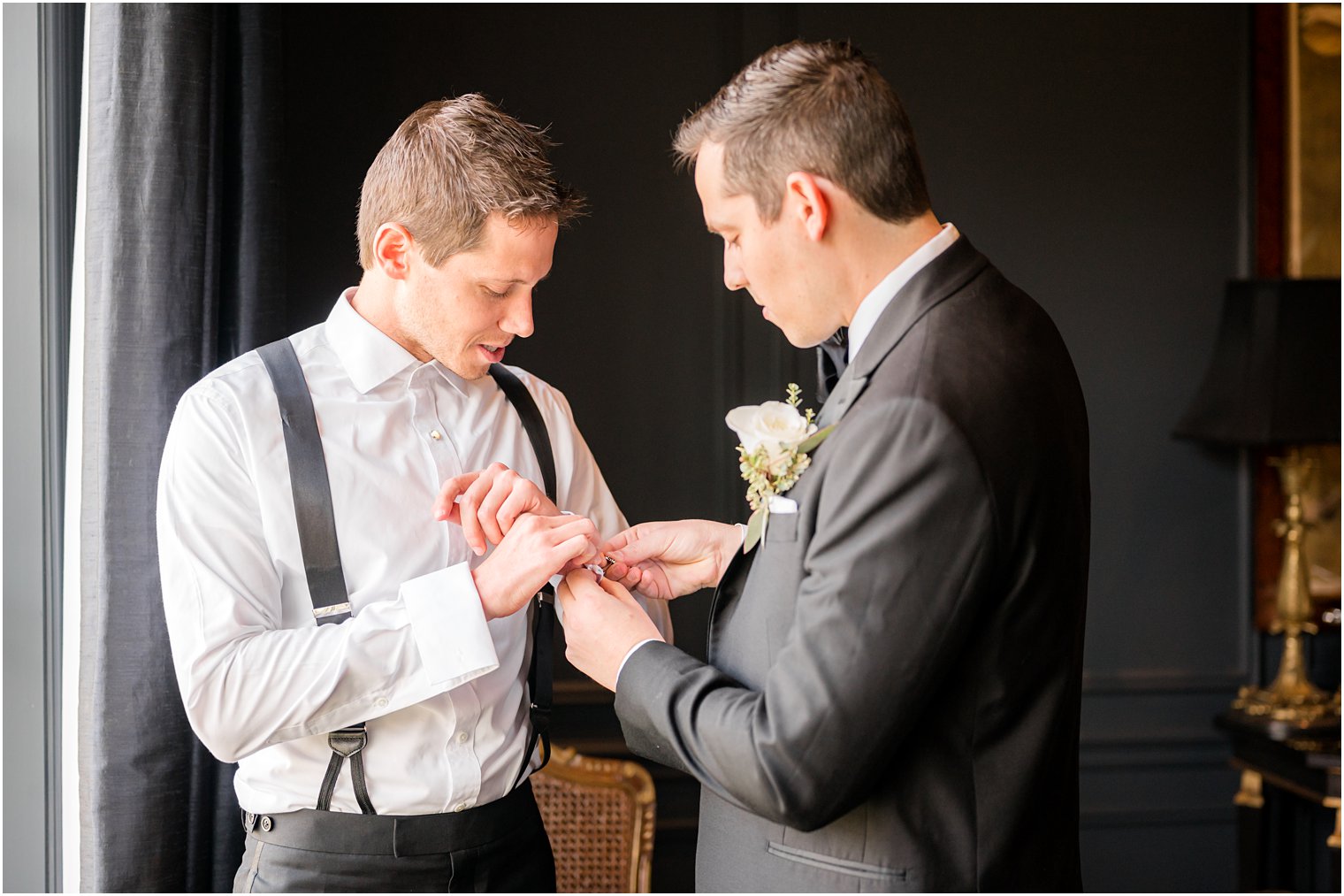 groom and groomsman prepare for NJ wedding day at Park Chateau Estate