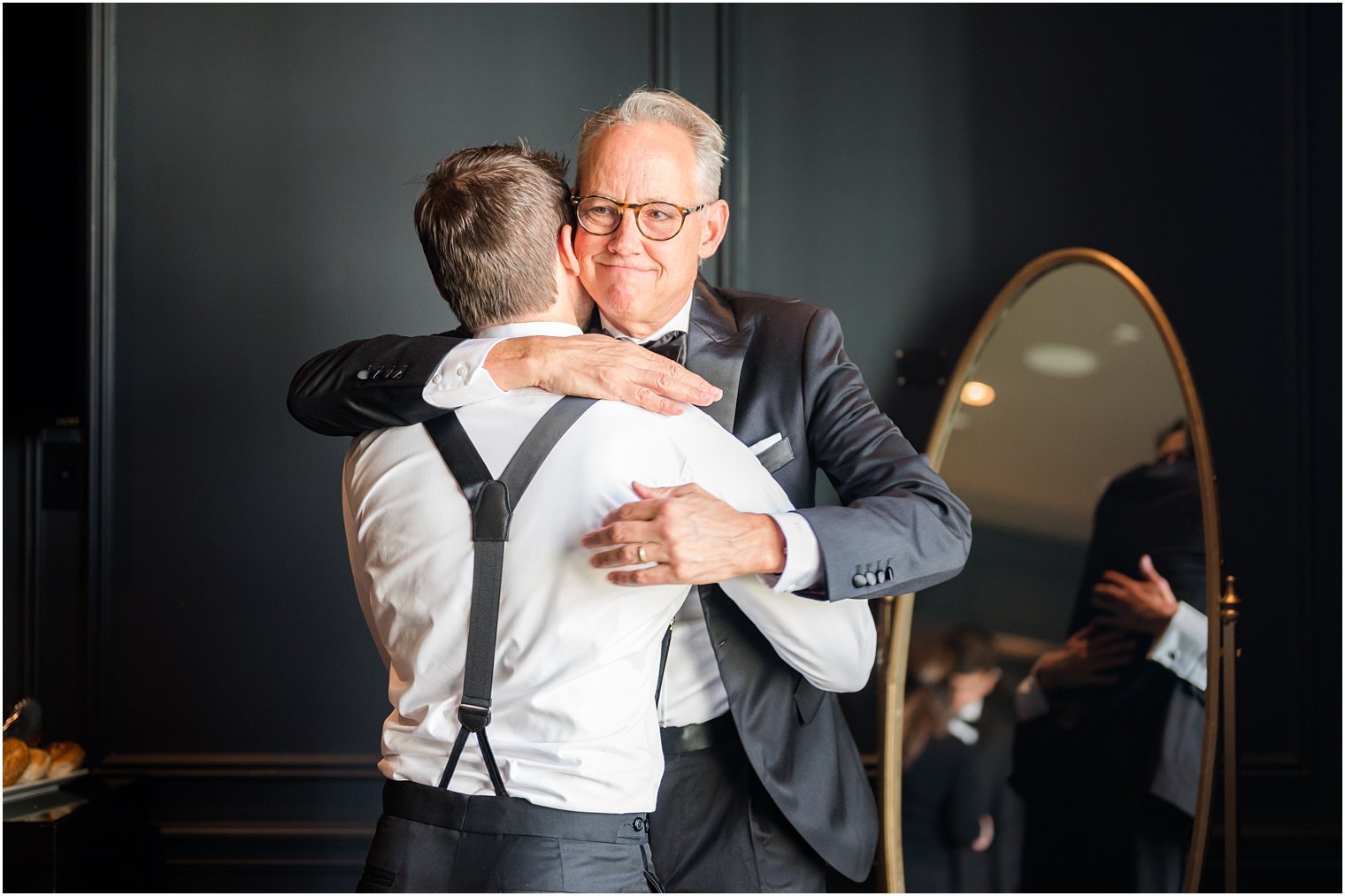 dad hugs groom before New Jersey wedding day at Park Chateau Estate