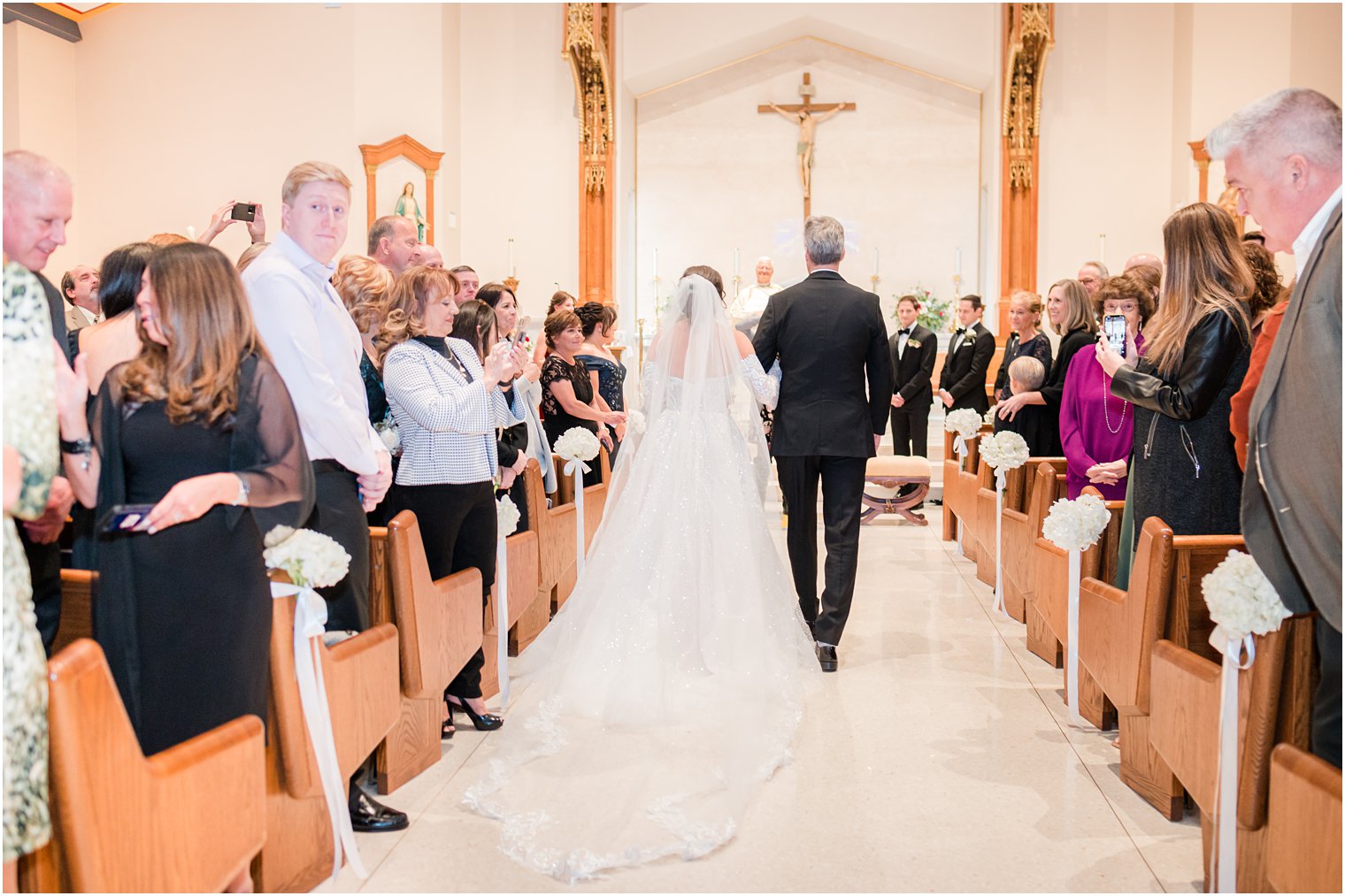 bride and dad walk down aisle for NJ wedding ceremony in church