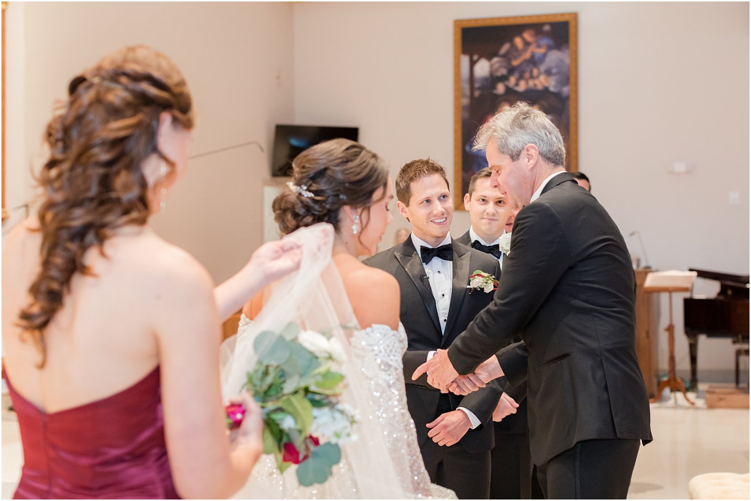 dad shakes groom's hand during NJ wedding ceremony 