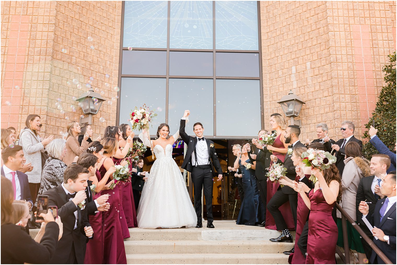 bride and groom cheer through bubble exit from New Jersey church