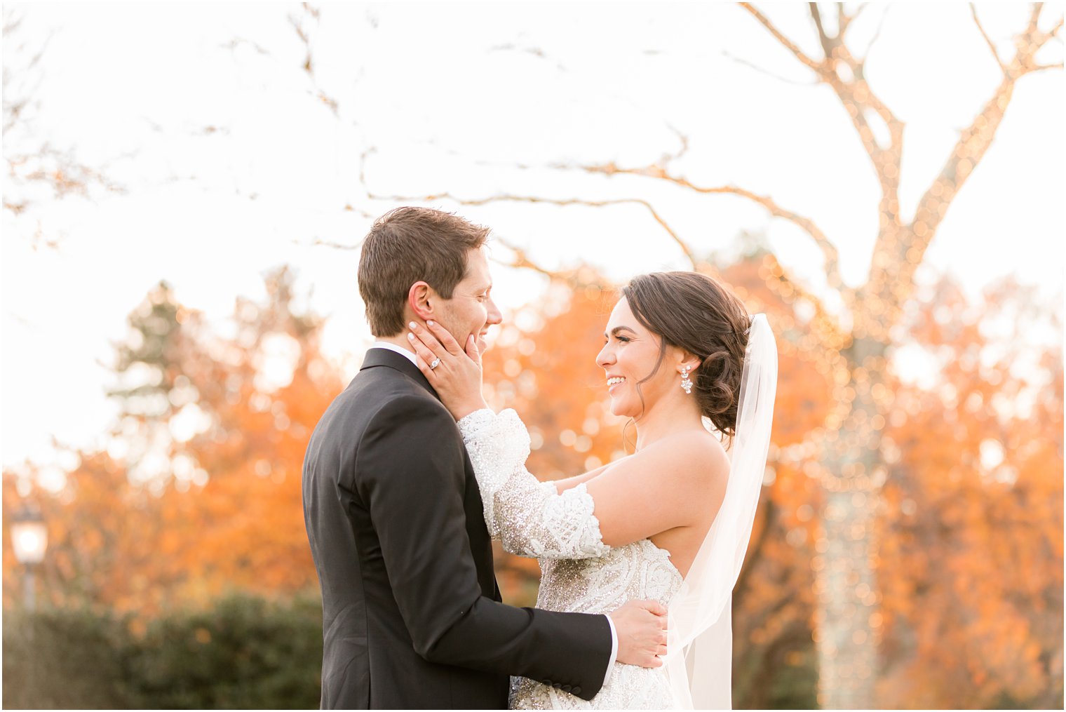 bride and groom laugh together during wedding portraits at Park Chateau Estate