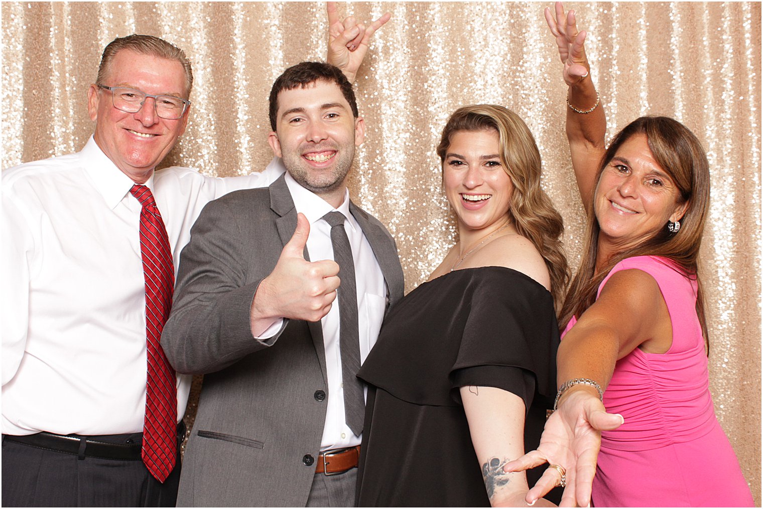 guests pose together in Indian Trail Club photo booth