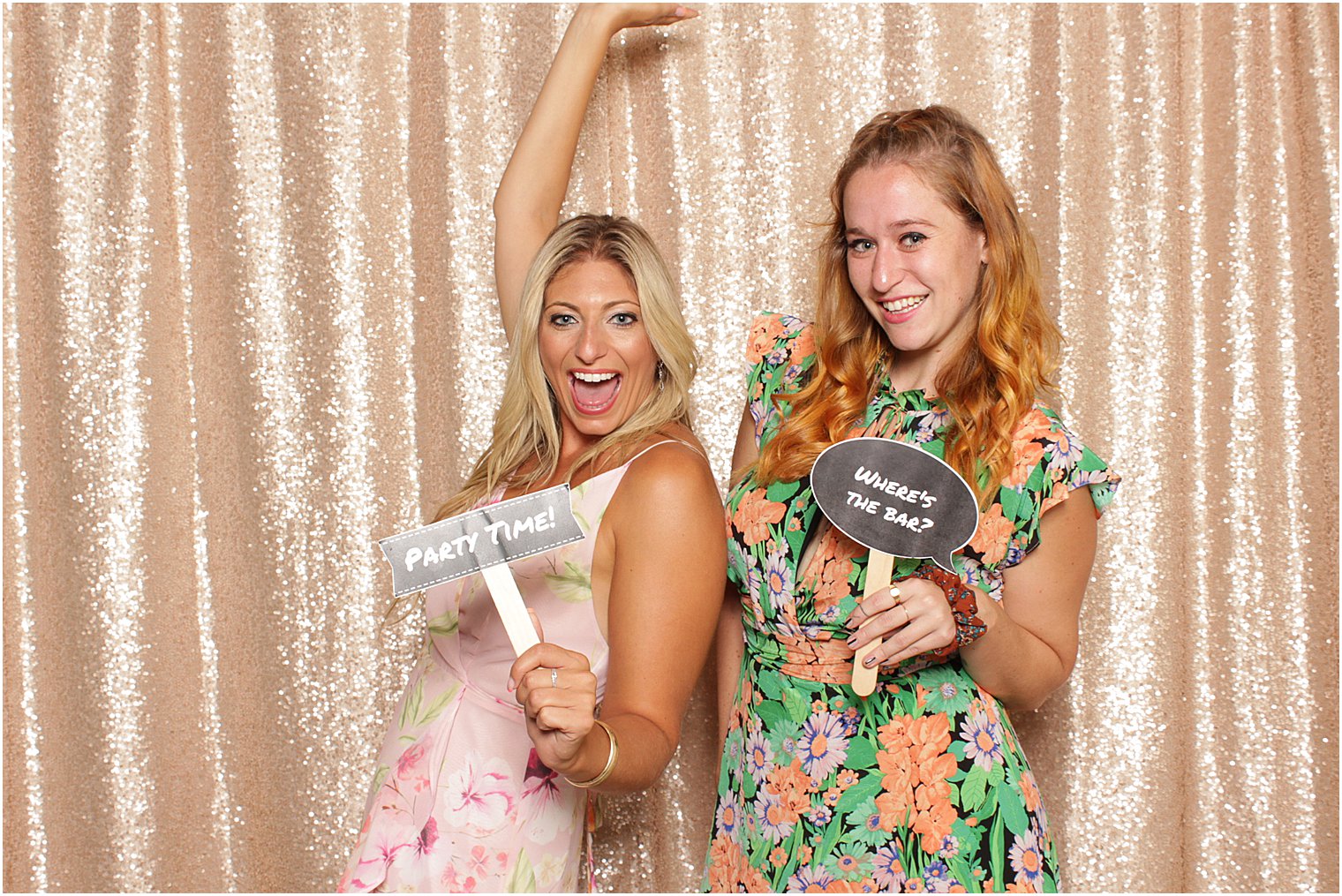 two women dance in Indian Trail Club photo booth