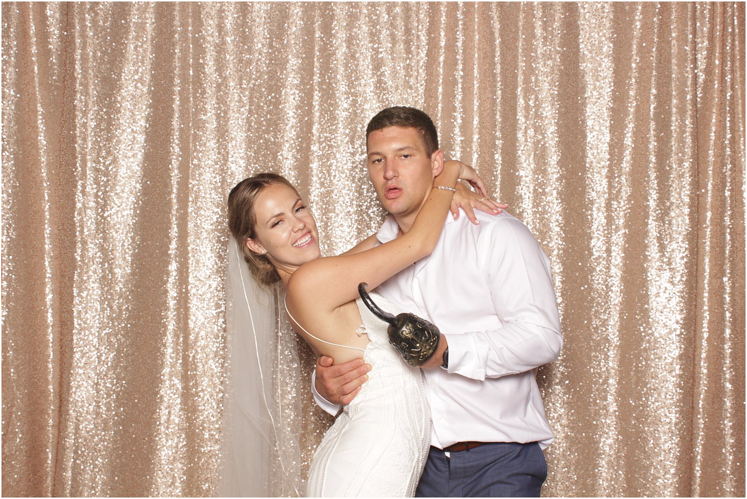 bride and groom hug during Minerals Resort photo booth