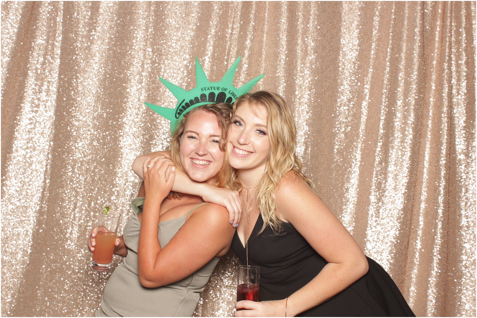 women hug during photo booth fun at Minerals Resort