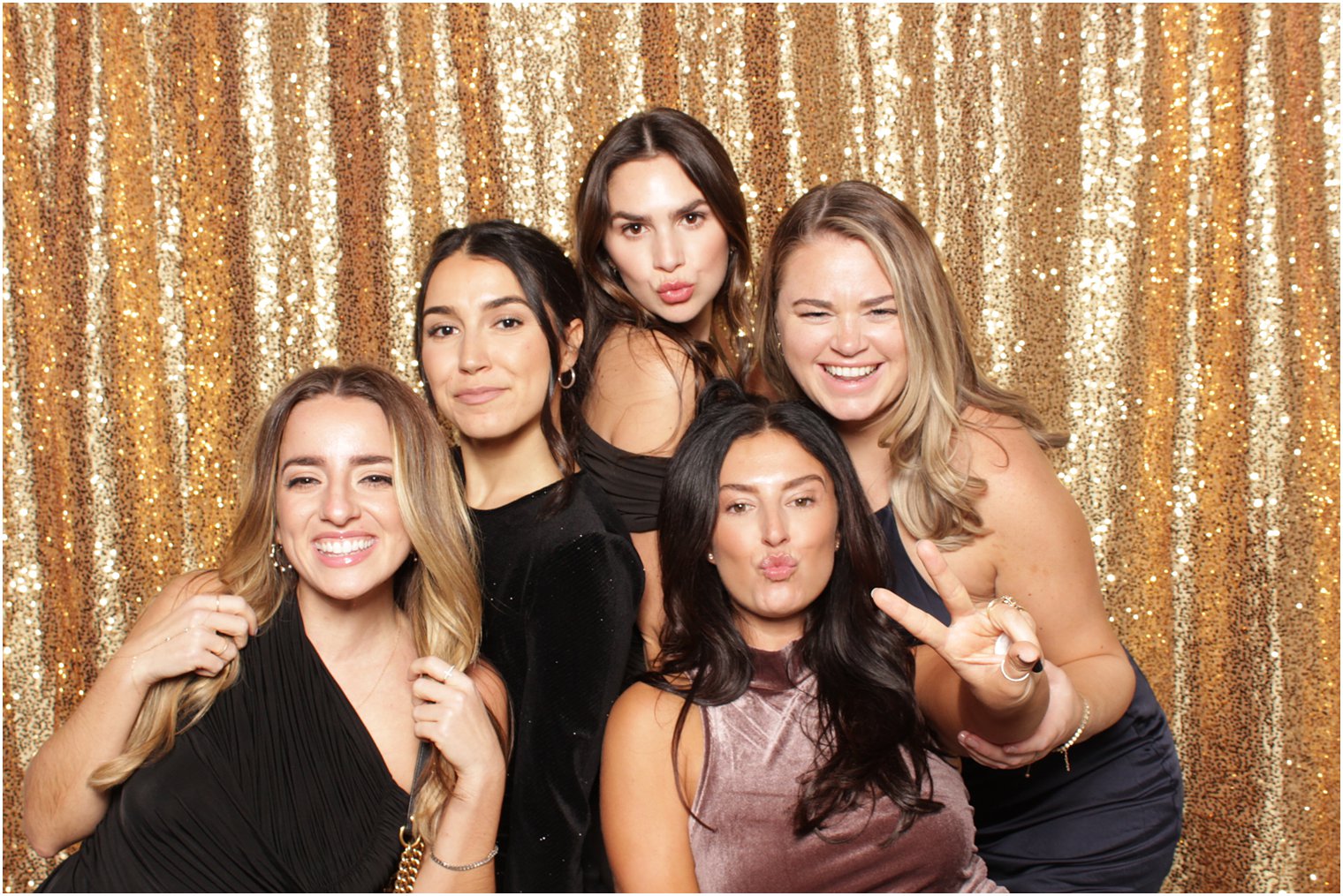 group of five women pose together during Valley Regency photo booth