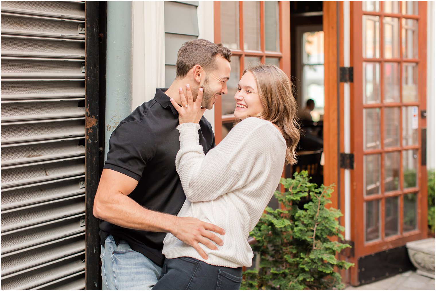 urban engagement session near Princeton University for couple hugging 