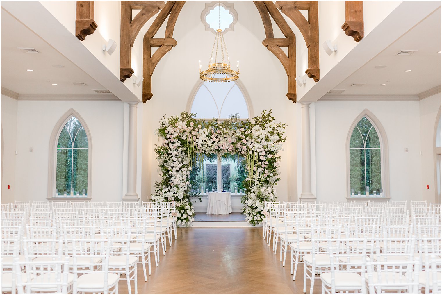 Jewish wedding ceremony with floral canopy at Park Chateau Estate 