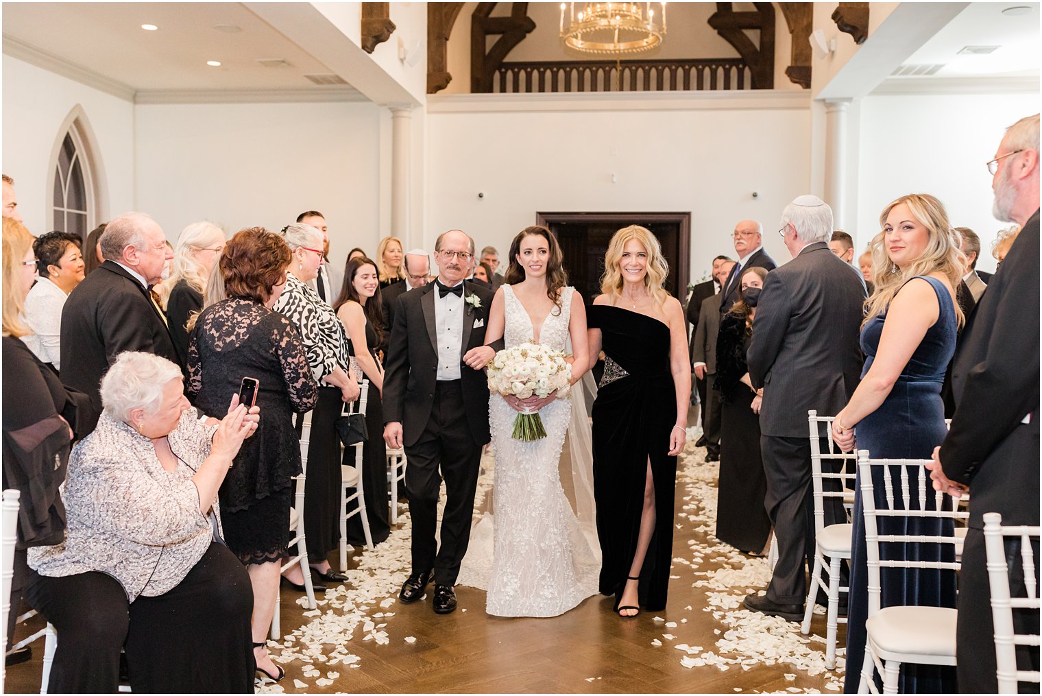 parents walk bride down aisle for wedding ceremony at Park Chateau Estate 