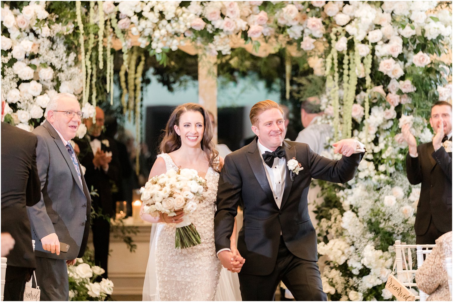 bride and groom walk up aisle after wedding ceremony in New Jersey 