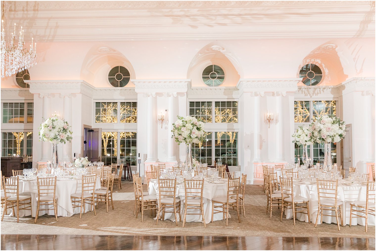 Park Chateau winter wedding reception with tall floral displays 