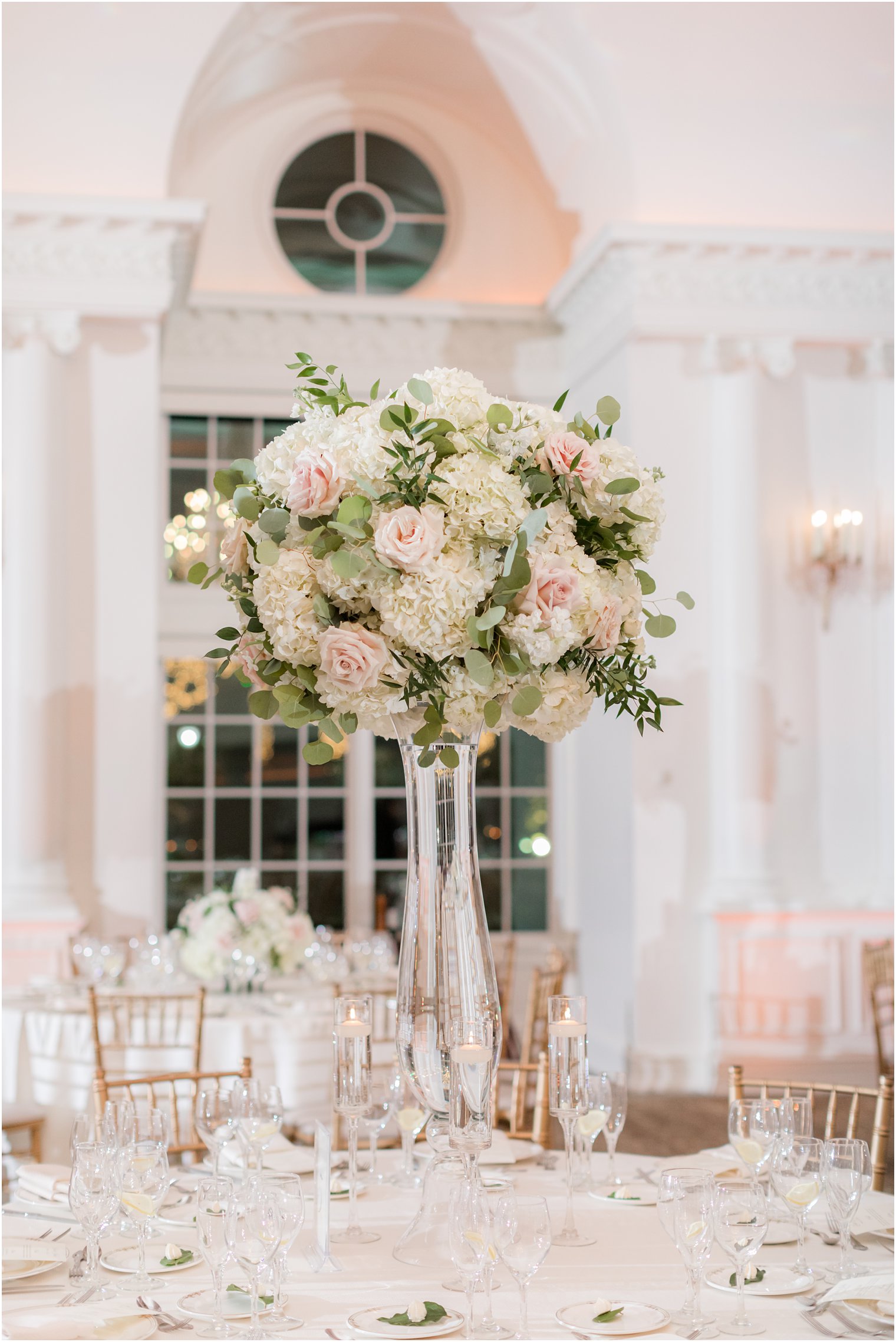 tall floral centerpieces with pink roses for winter wedding reception in East Brunswick NJ