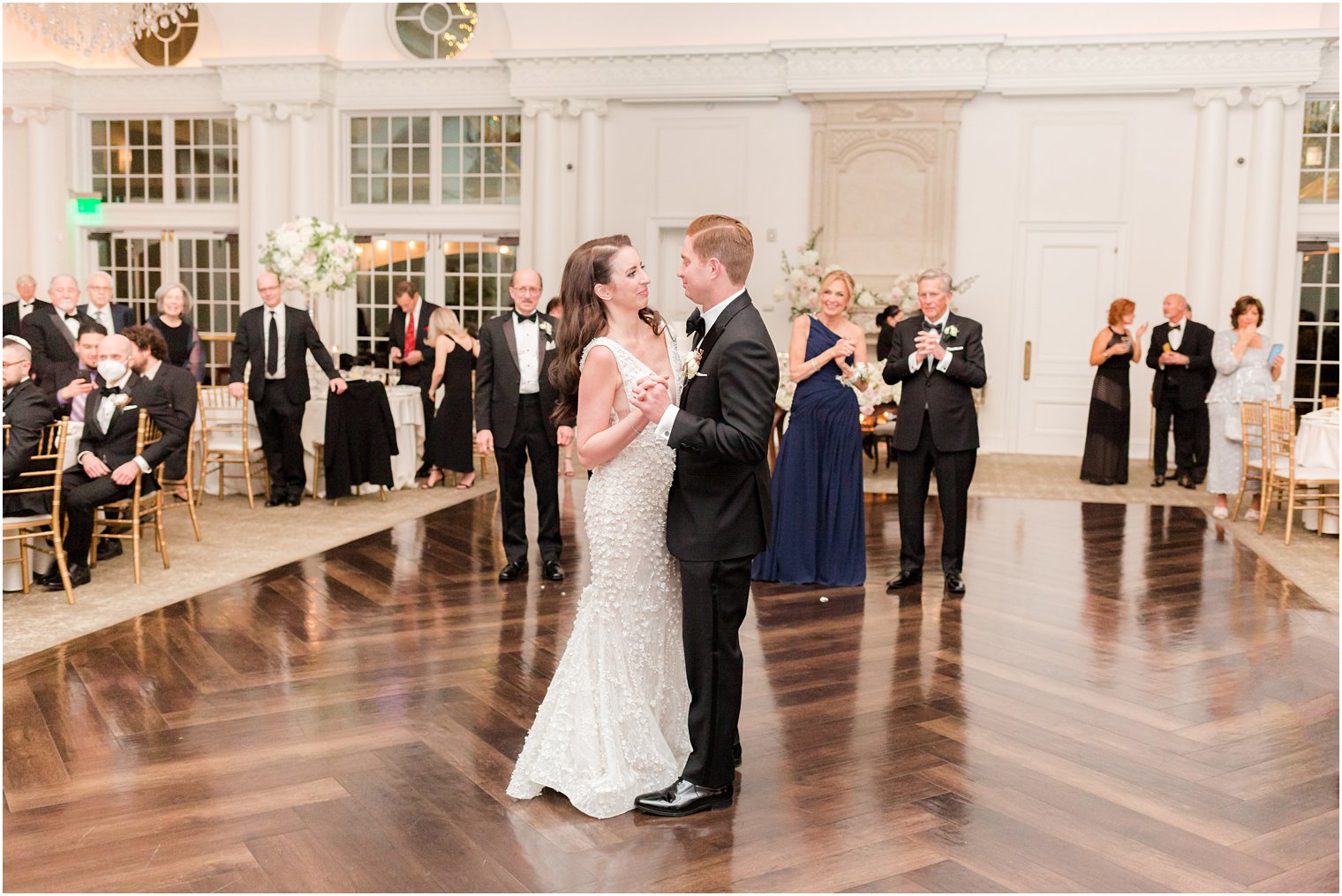 bride and groom have first dance during East Brunswick NJ wedding reception 