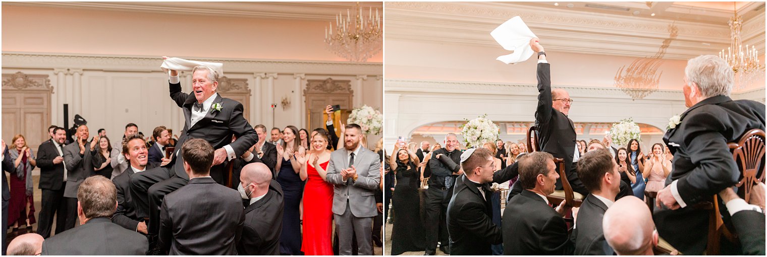 fathers twirl napkins during Hora at East Brunswick NJ wedding reception 