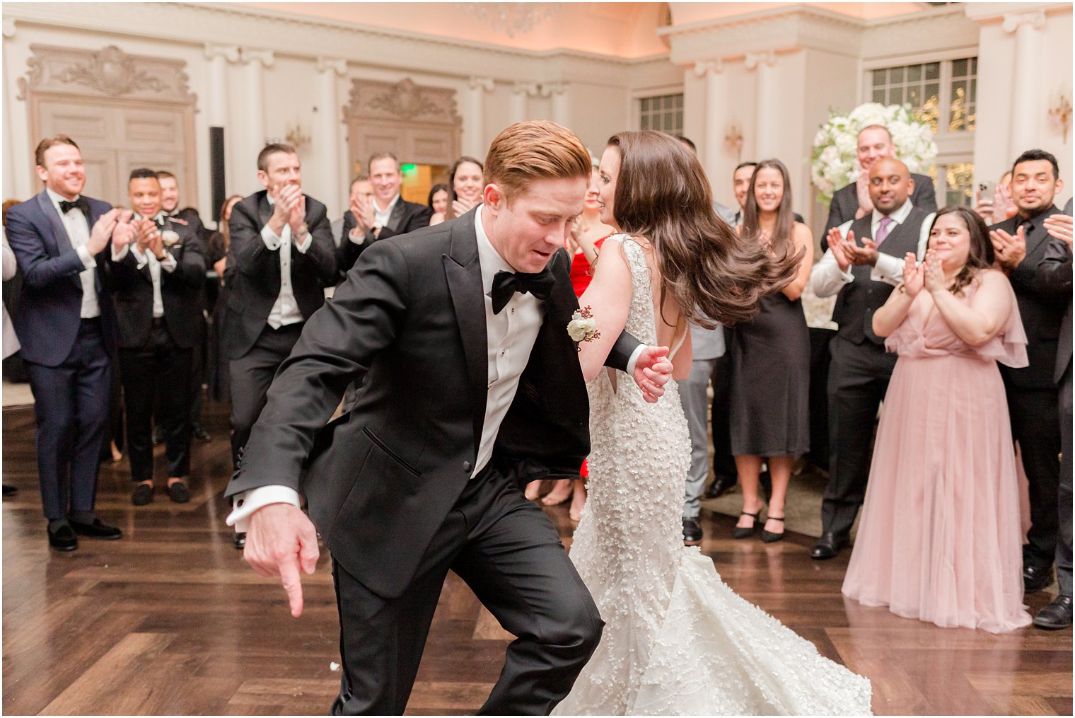 bride and groom dance together during East Brunswick NJ wedding reception 