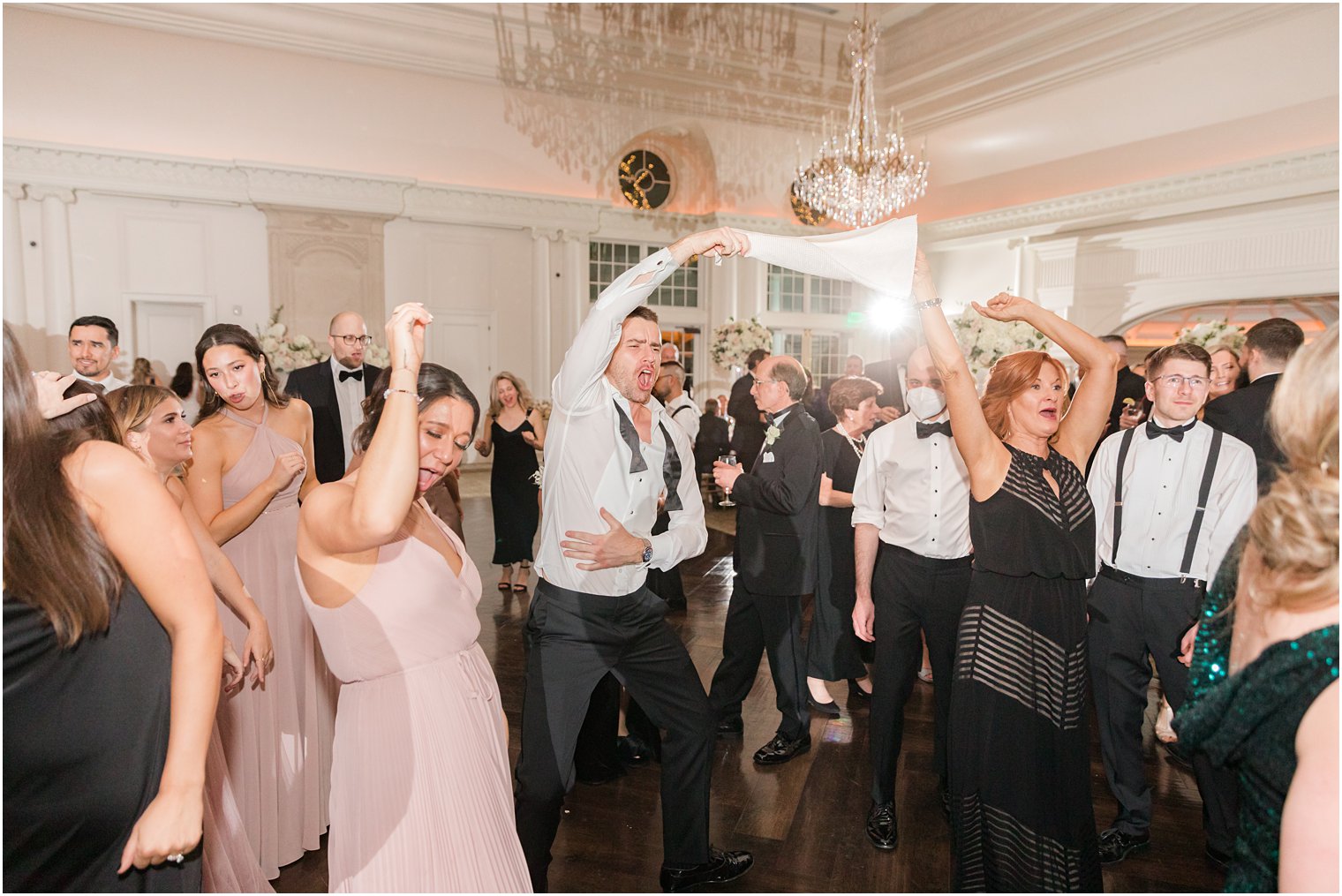 groomsman and bridesmaid dance during East Brunswick NJ wedding reception 