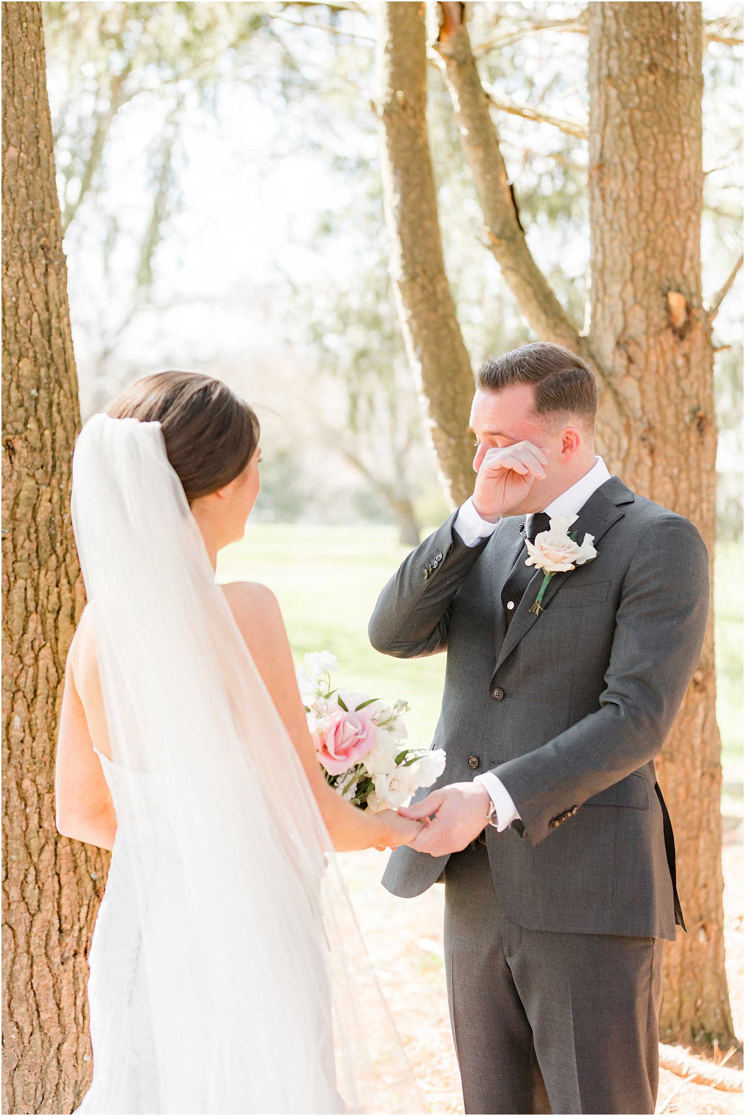 groom cries during emotional first look at The Refinery at Perona Farms