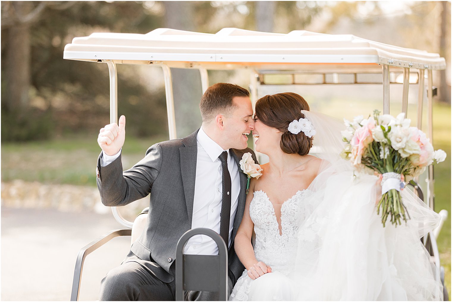 bride and groom kiss on golf cart